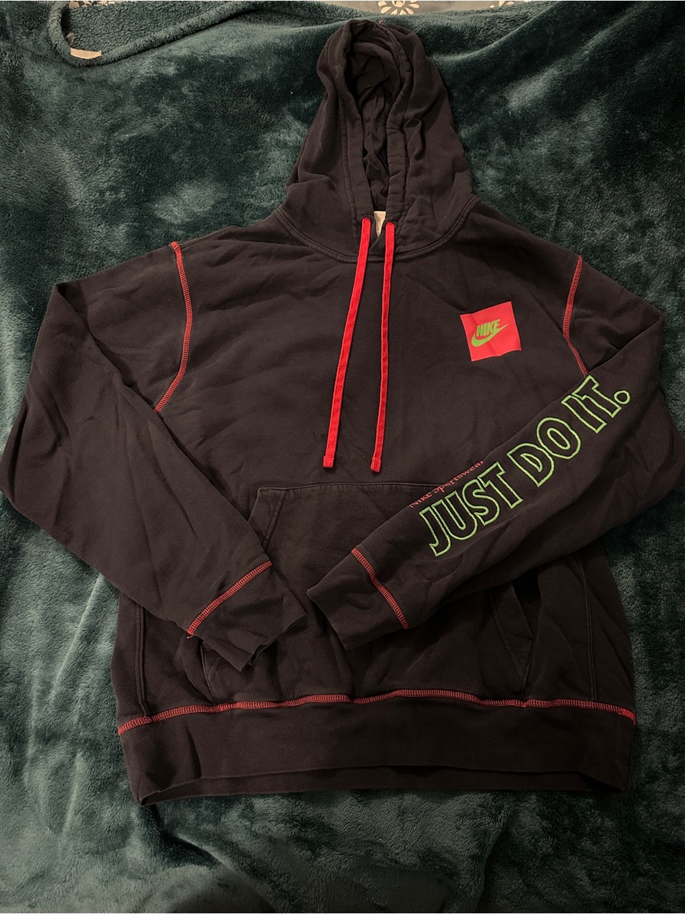 Nike Navy Blue Hoodie with Red Drawstrings and Neon Green 'JUST DO IT.' Sleeve